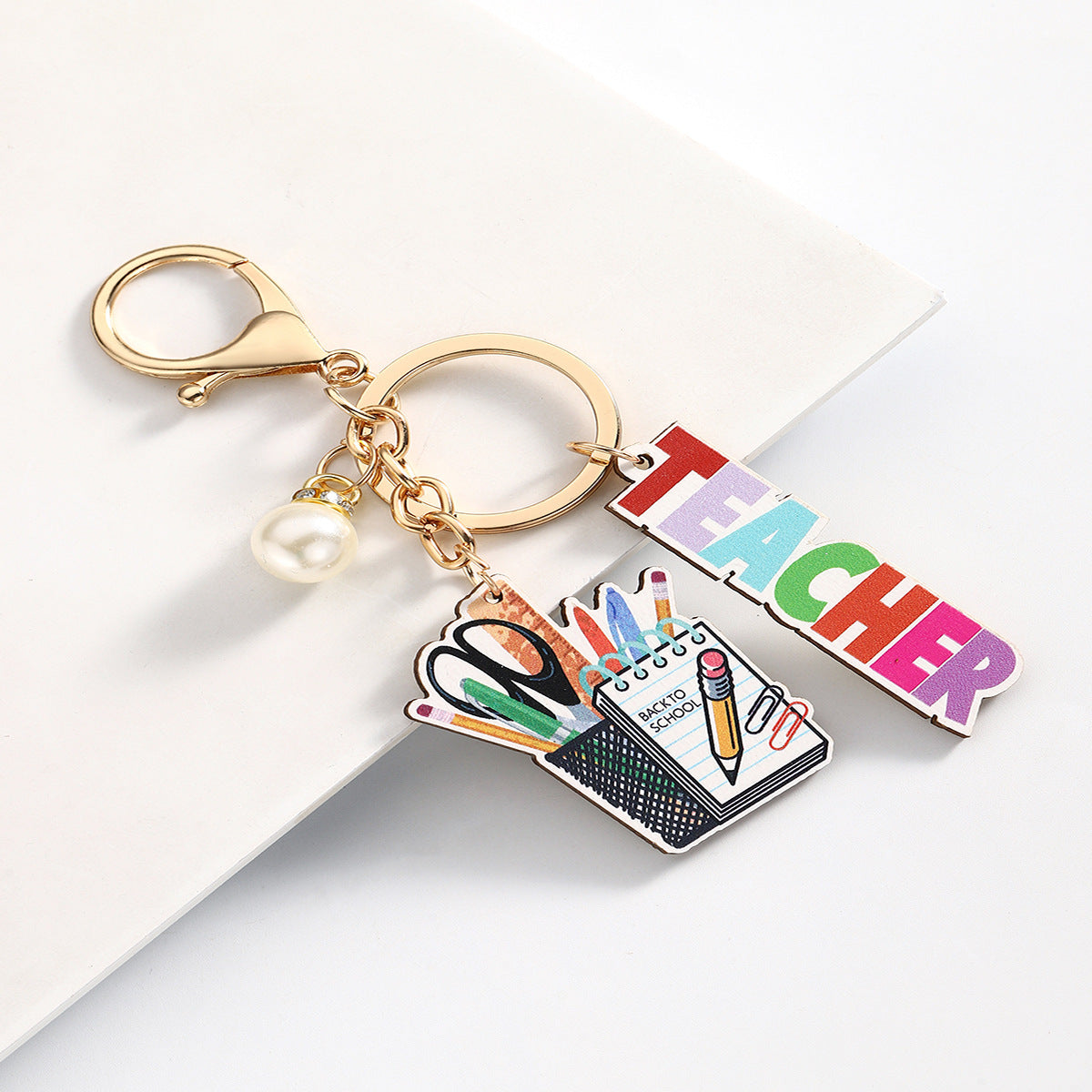 Personalized Best Teacher Wooden Keychain engraved on premium wood by Giftsnboxes Nigeria.