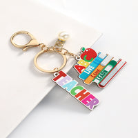 Personalized Best Teacher Wooden Keychain engraved on premium wood by Giftsnboxes Nigeria.