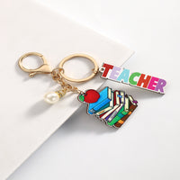 Personalized Best Teacher Wooden Keychain engraved on premium wood by Giftsnboxes Nigeria.