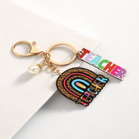 Personalized Best Teacher Wooden Keychain engraved on premium wood by Giftsnboxes Nigeria.
