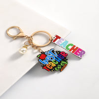 Personalized Best Teacher Wooden Keychain engraved on premium wood by Giftsnboxes Nigeria.